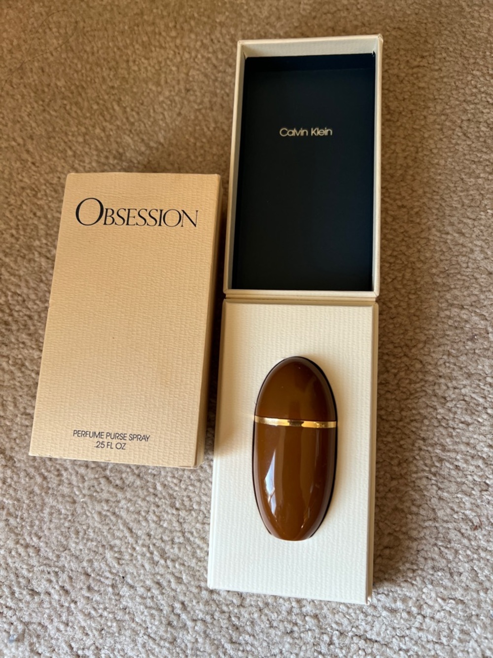 Calvin Klein Obsession Compact Perfume Spray in Brown with Gold Trim